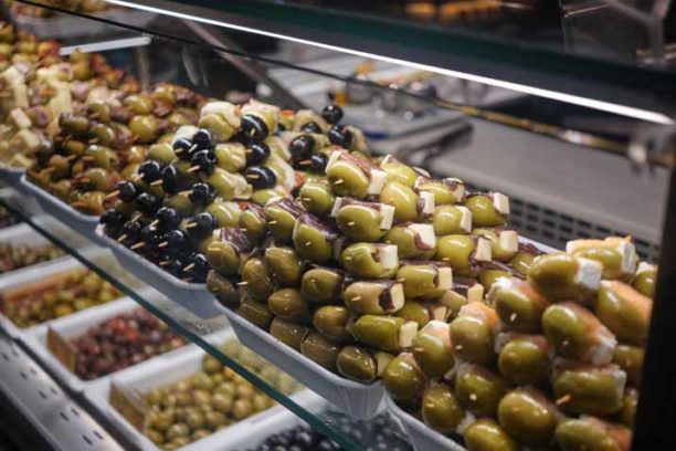 typical food in spain - Spanish food tapas display at Mercado de San Miguel market Madrid