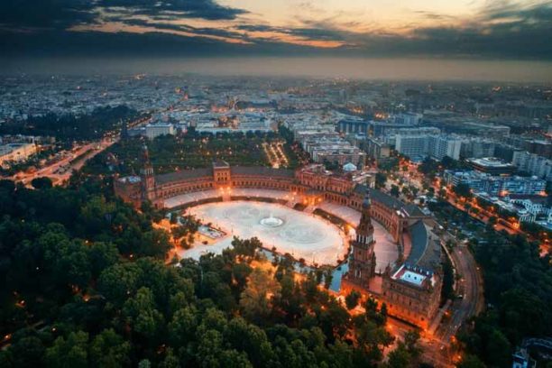 Plaza de Espana or Spain Square aerial view at night in Seville, Spain